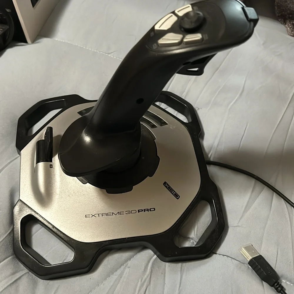Logitech, extreme 3-D pro joystick/the club a mature game for windows. Vintge